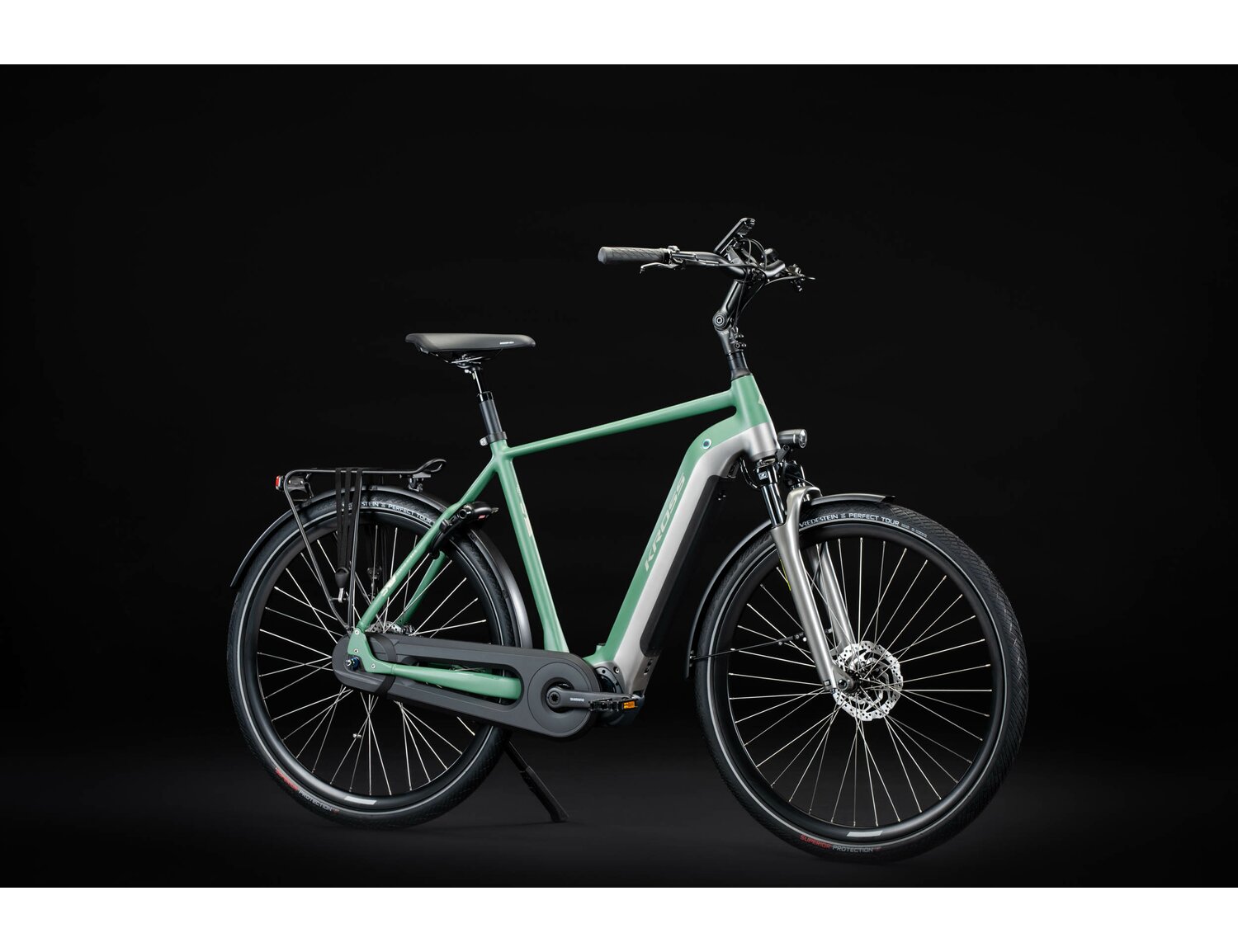  Elektryczny rower miejski Ebike City KROSS Sentio Hybrid 6.0 500 Wh na aluminiowej ramie w kolorze zielonym wyposażony w osprzęt shimano i napęd elektryczny Shimano