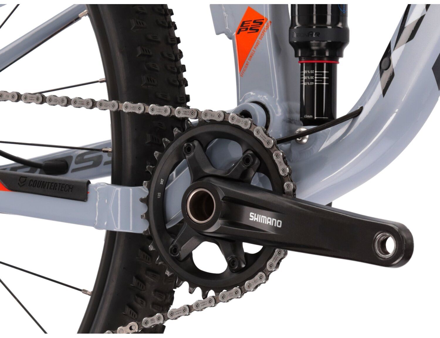  Tylny amortyzator Rock Shox Deluxe Select RL oraz mechanizm korbowy Shimano MT510 w rowerze górskim MTB XC KROSS Earth 2.0 