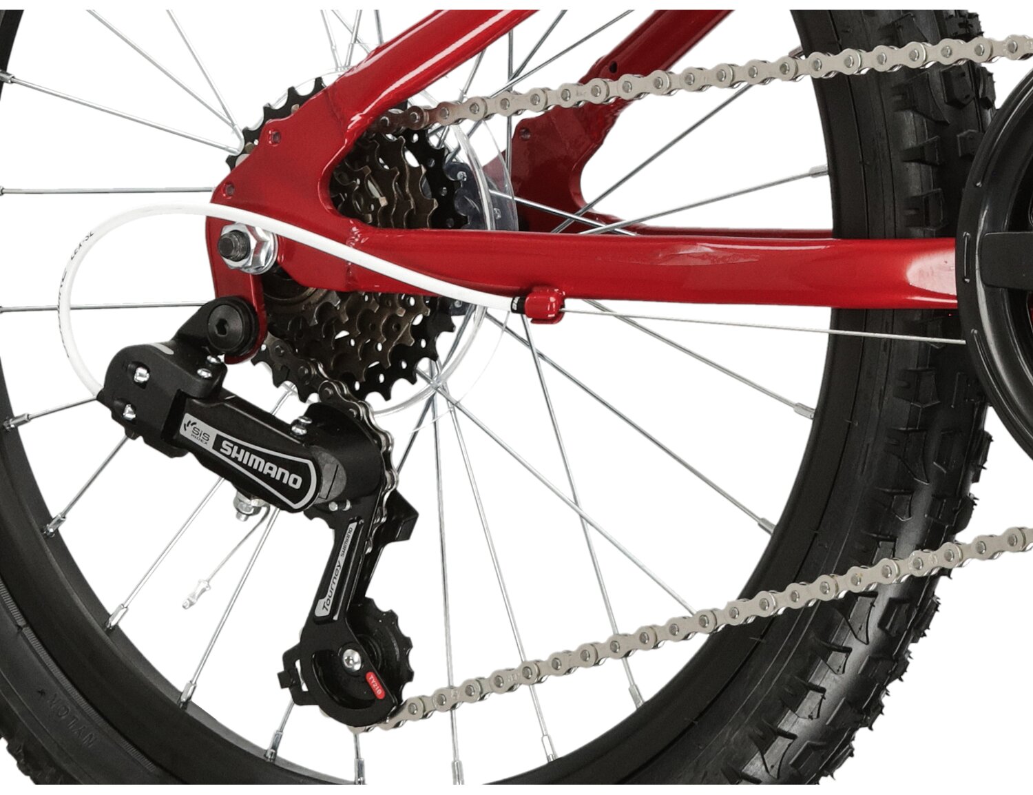  Tylna sześciorzędowa przerzutka Shimano Tourney TY21 oraz hamulce v-brake w rowerze dziecięcym KROSS Berg Mini 