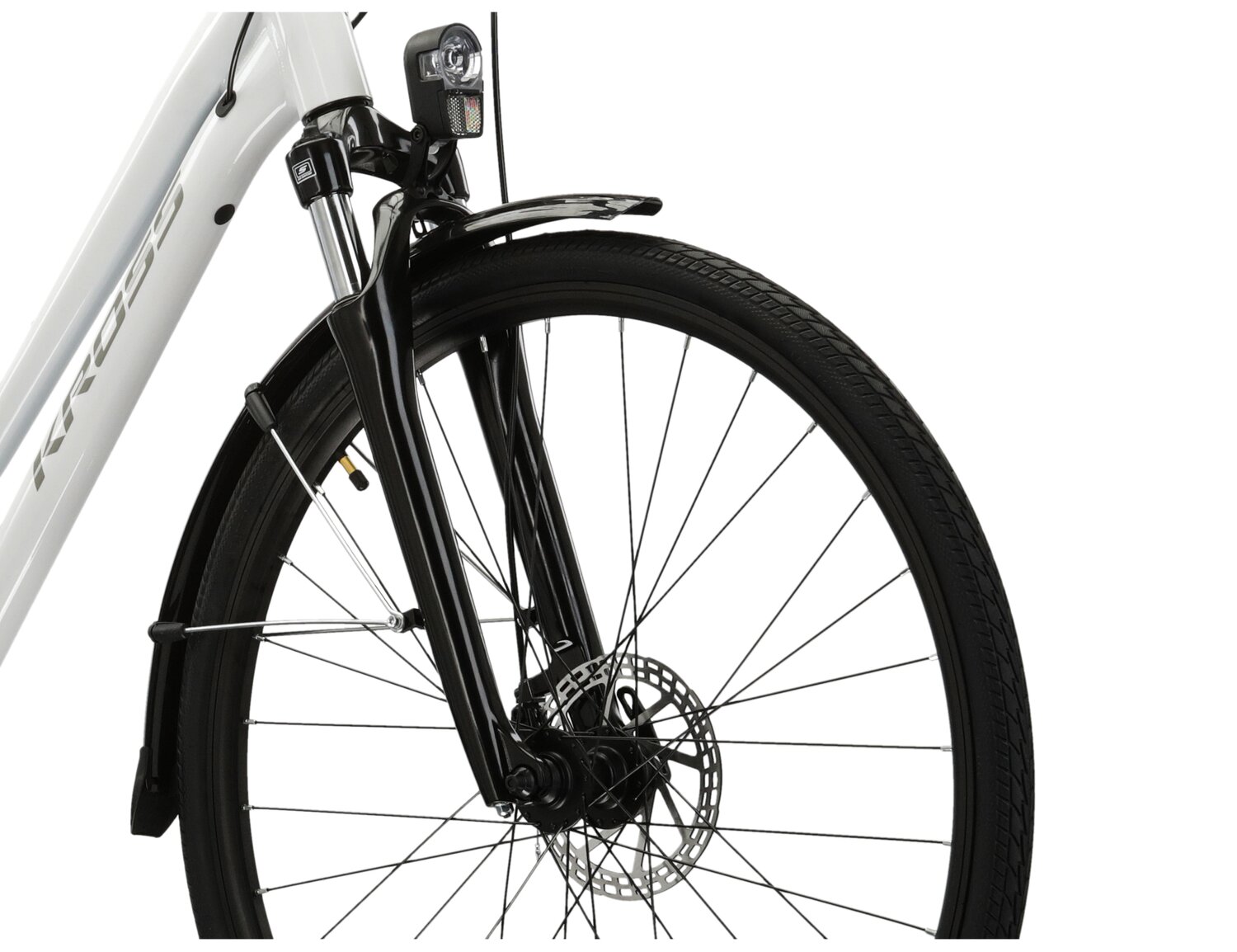 Aluminowa rama, amortyzowany widelec SR SUNTOUR NEX oraz opony Wanda w rowerze trekkingowym damskim KROSS Trans 3.0 