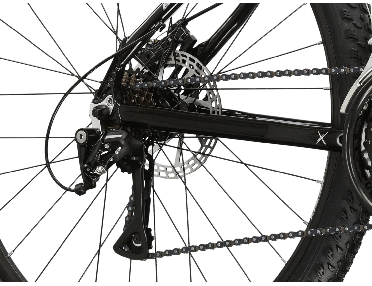  Tylna siedmiobiegowa przerzutka Shimano Acera M3020 oraz mechaniczne hamulce tarczowe w rowerze górskim MTB KROSS Berg JR 2.0 