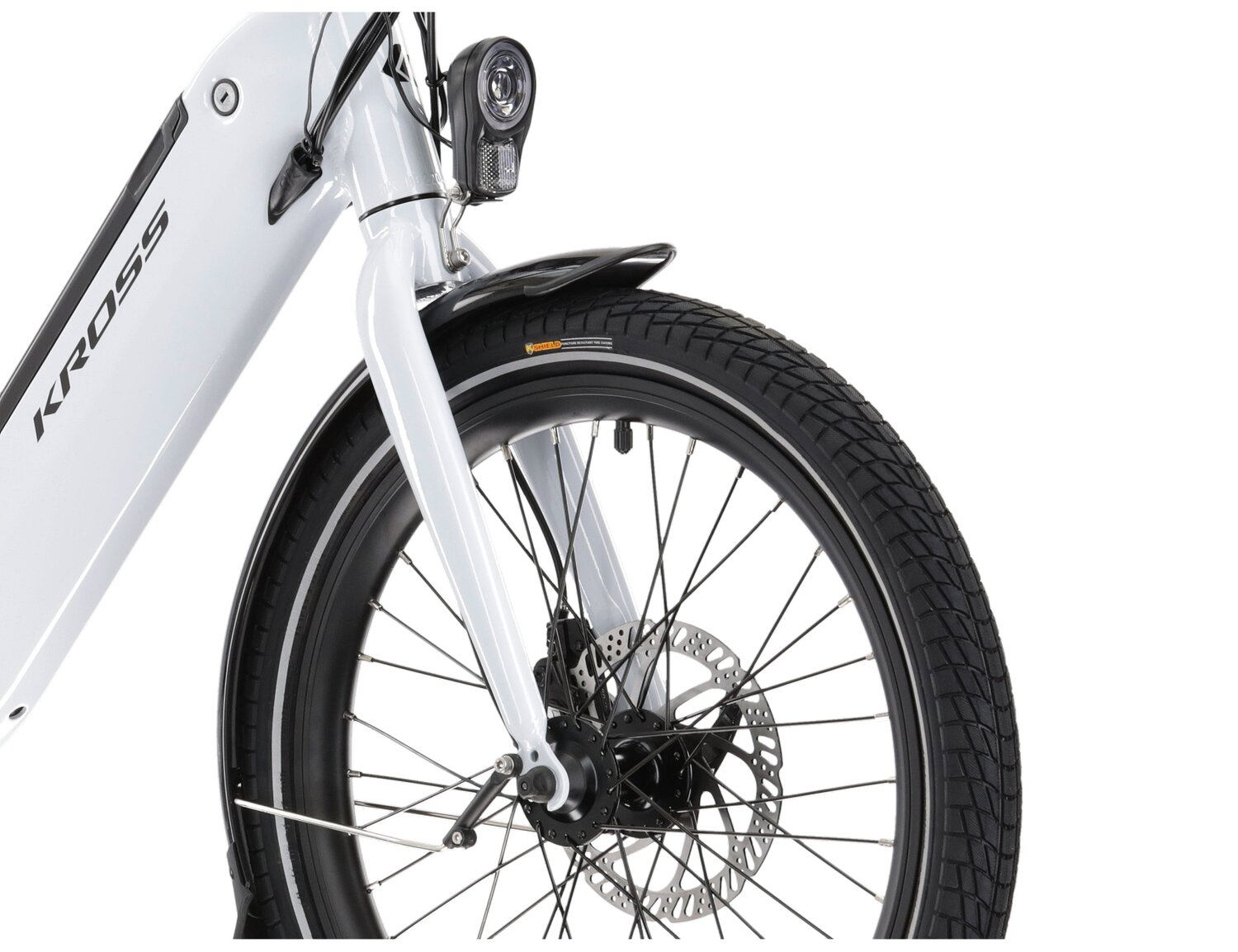 Aluminowa rama, amortyzowany widelec SR SUNTOUR NEX HLO o skoku 63mm oraz opony w elektrycznym rowerze miejskim Ebike City KROSS Flex Hybrid 1.0 367 Wh 