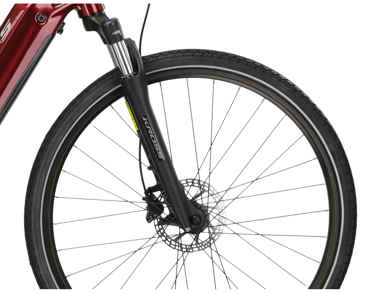 Aluminowa rama, amortyzowany widelec SR SUNTOUR NEX HLO o skoku 63 mm oraz opony w elektrycznym rowerze crossowym KROSS Evado Hybrid 2.0 730 Wh