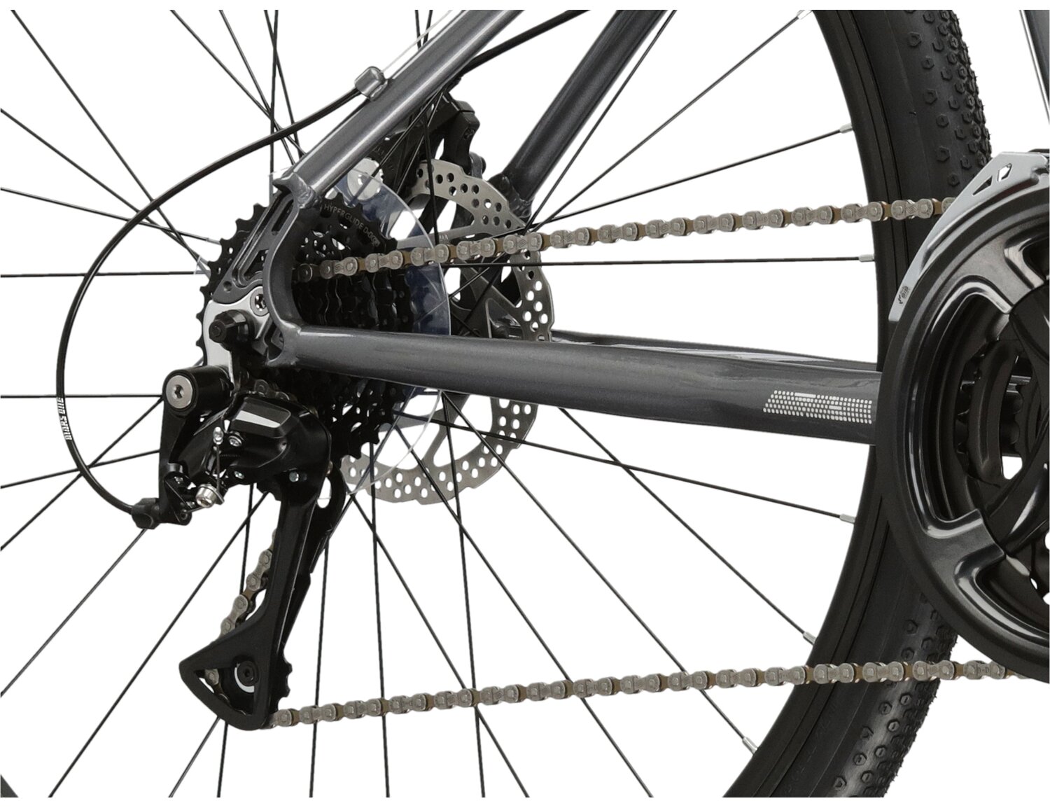  Tylna ośmiobiegowa przerzutka Shimano Acera M3020 oraz mechaniczne hamulce tarczowe w rowerze crossowym KROSS Tour 2.0 
